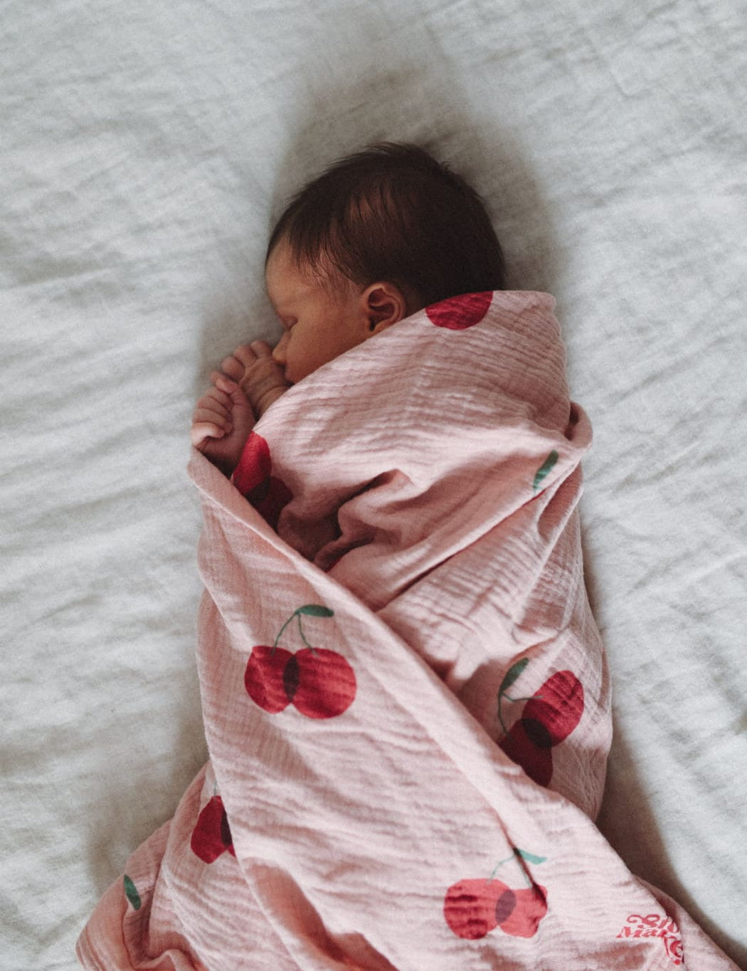 Story_Makers_Cherry_Swaddle_1.jpg