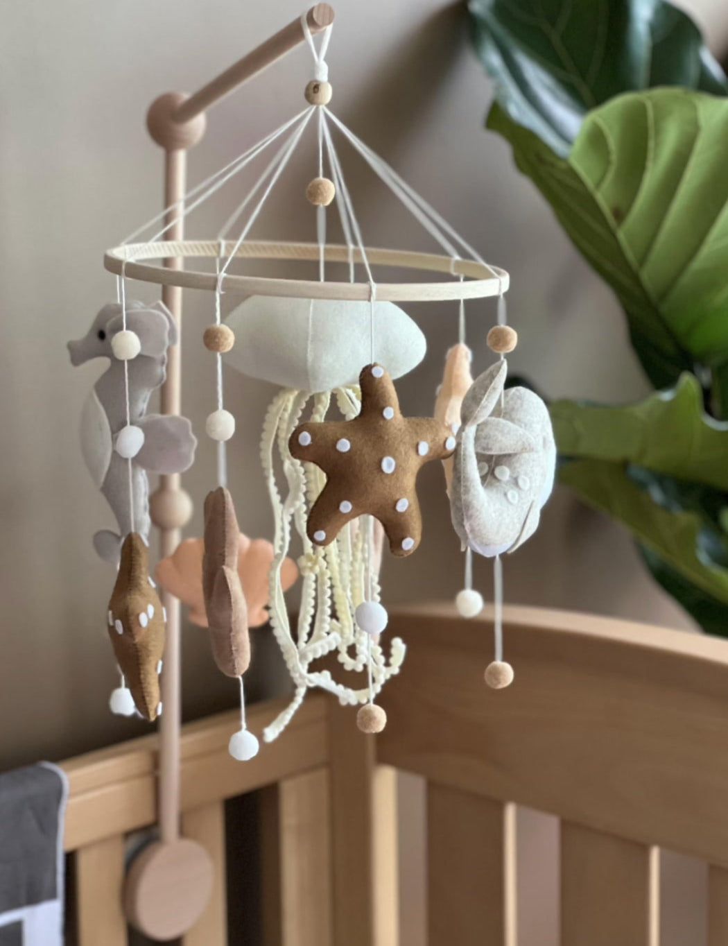 baby mobile with a seahorse, jellyfish, sea star and more